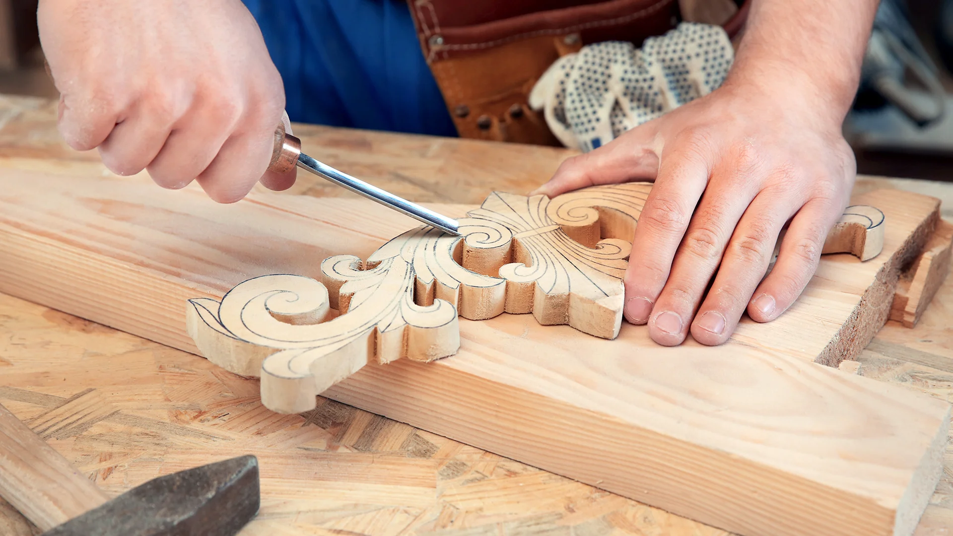 Carpenter-with-chisel-in-workshop